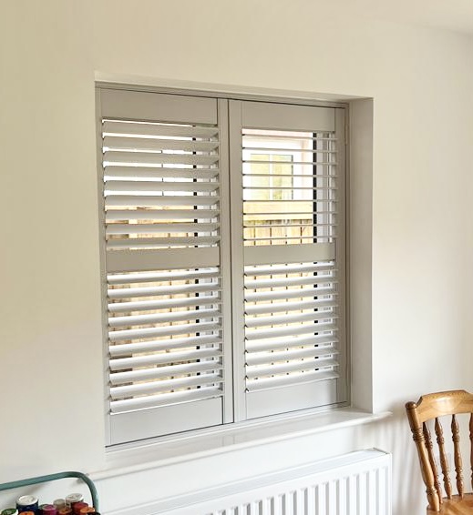 White shutters installed in a contemporary living space